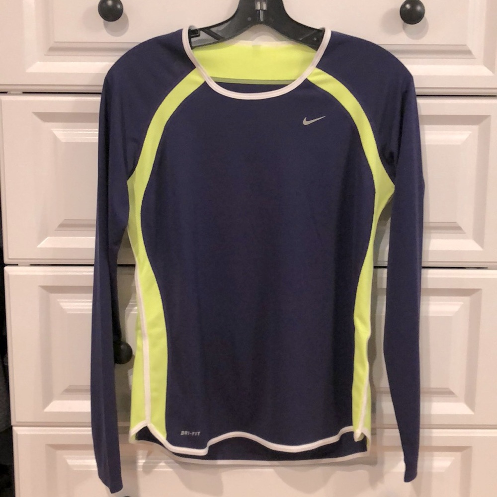 NWOT. Nike Dri-Fit. 100% polyester, great colors. Purple, chartreuse, and white.